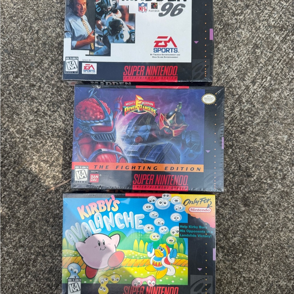 Nintendo Super Nintendo Game Trio - Gray, Black, Blue, Pink